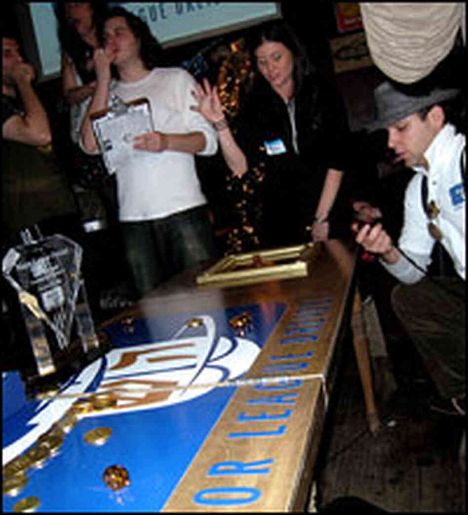 Defending Major League Dreidel champion Pamskee spins in the championship.