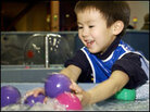 A child plays at the WaterWays exhibit at the San Jose Children's Museum. A child plays at the WaterWays exhibit at the San Jose Children's Museum.