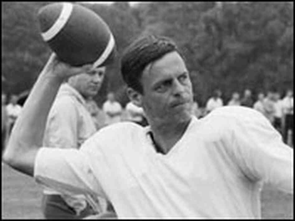 George Plimpton with football
