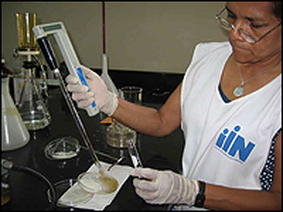 Researcher tests water Researcher tests water