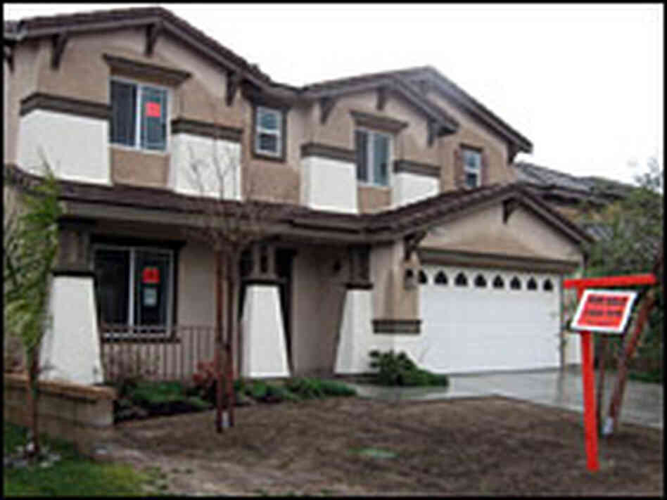 In Fontana, Calif., a house that's gone into foreclosure sports a telltale brown, untended lawn.