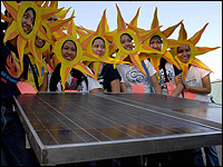 Solar advocates in Manila participate in a recent parade. Solar advocates in Manila participate in a recent parade.