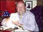 Tretyakov at home with his cat, Matilda Tretyakov at home with his cat, Matilda
