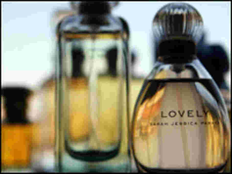 Bottles of Hermes' Un Jardin sur le Nil and Sarah Jessica Parker's Lovely perfumes.