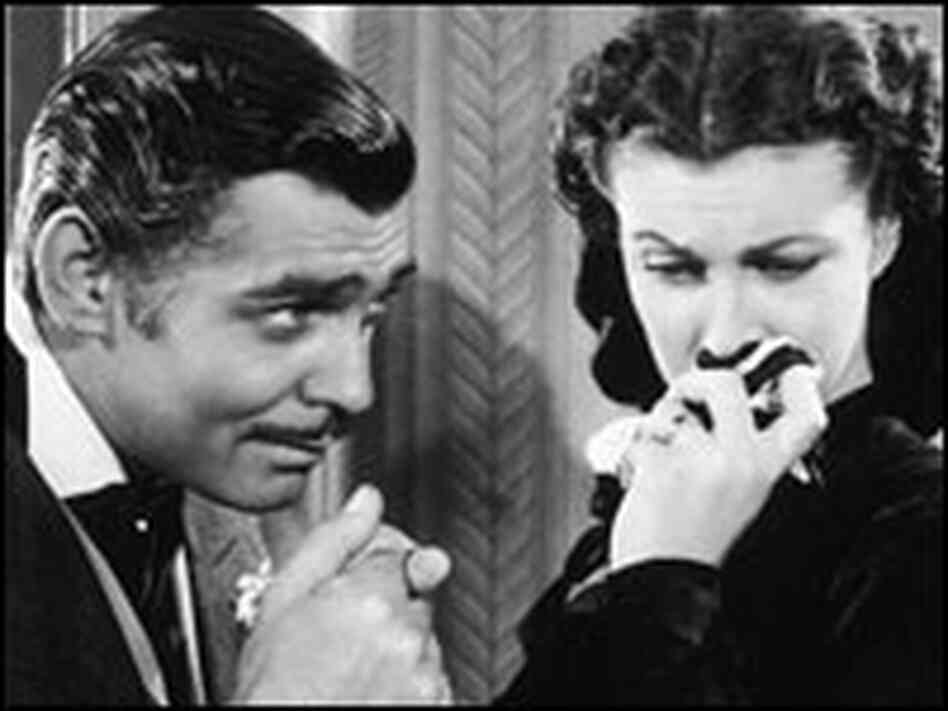 Clark Gable kisses Vivien Leigh's hand