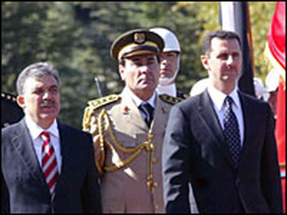 Syrian President Bashar al-Assad (front right) and his Turkish counterpart Abdullah Gul (front left)