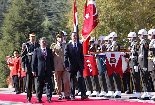 Syrian President Bashar al-Assad (front right) and his Turkish counterpart Abdullah Gul (front left)
