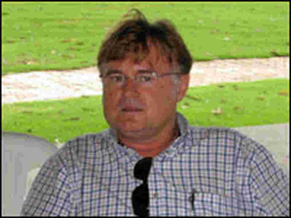Soy tycoon Erai Maggi, 48, sits on the veranda of his 100,000 acre soy farm.