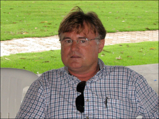 Soy tycoon Erai Maggi, 48, sits on the veranda of his 100,000 acre soy farm.