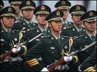 Chinese People's Liberation Army officers march in October. Chinese People's Liberation Army officers march in October.