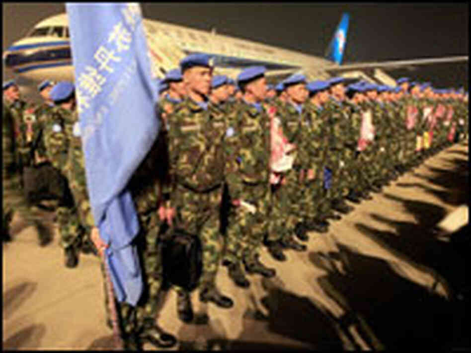 Soldiers in a Chinese peacekeeping unit wear sky-blue United Nations berets in November.