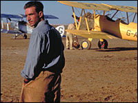 Ralph Fiennes with biplane