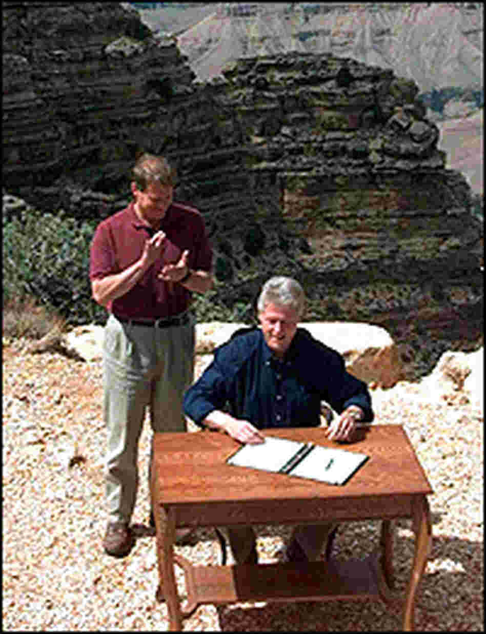 President Bill Clinton signs an order to designate Grand Staircase-Escalante national monument.