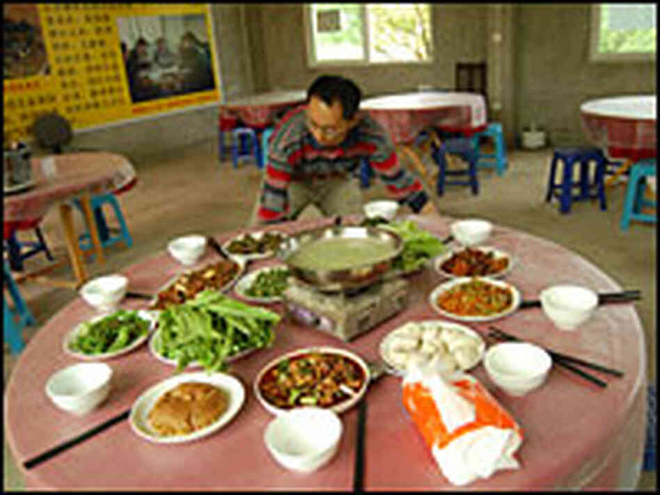 Luo earns most of his money from the organic lunches he serves to the farm's visitors.