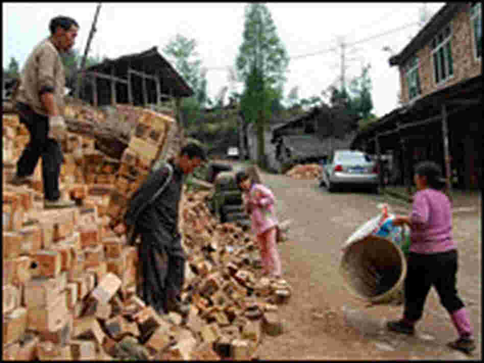 Yao's family pitches in to help construction workers.