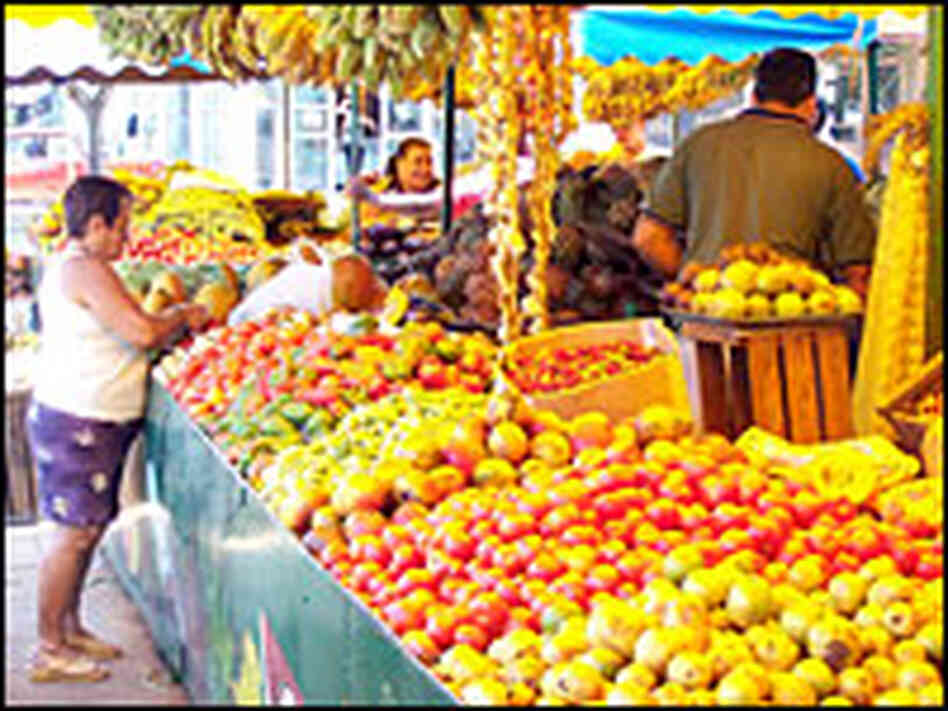 Fruit and vegetables are abundant at semi-private markets.