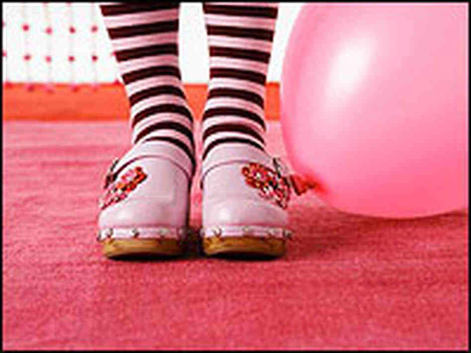 Feet in pink clogs Feet in pink clogs