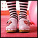 Feet in pink clogs CREDIT: Sean Justice/Corbis