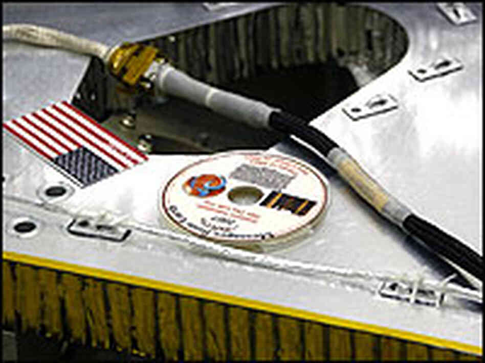 Phoenix DVD shown installed on the deck of the Phoenix lander Phoenix DVD shown installed on the deck of the Phoenix lander