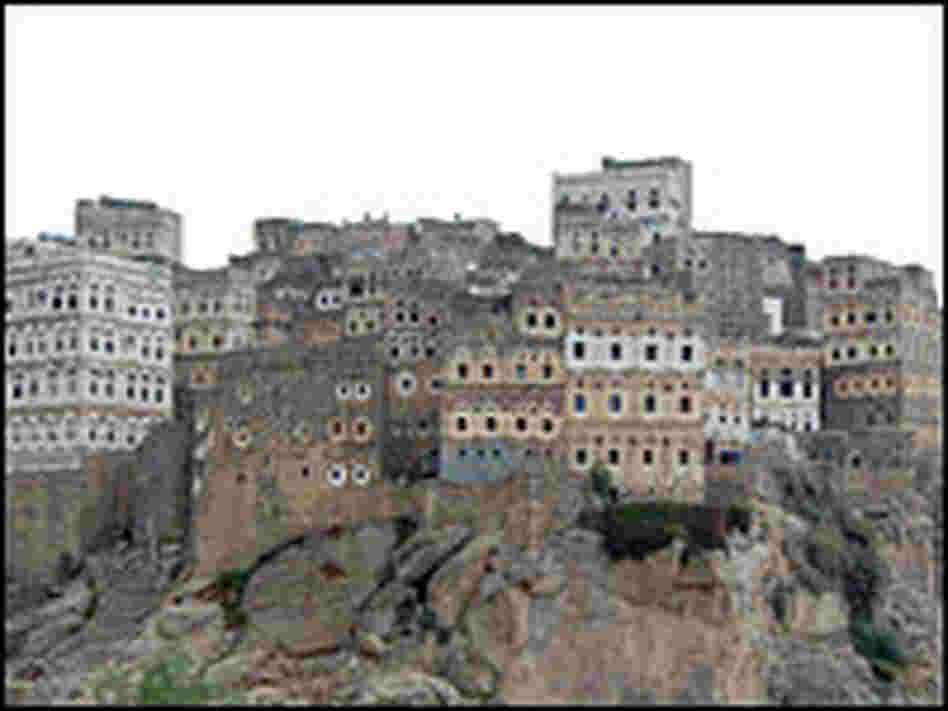 The village of Hajjarah is perched precariously on a stone cliff, accessible only by footpath.