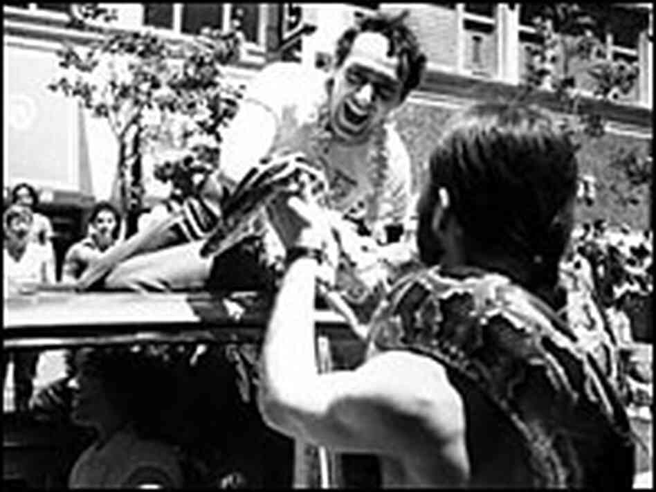 Milk greets supporters