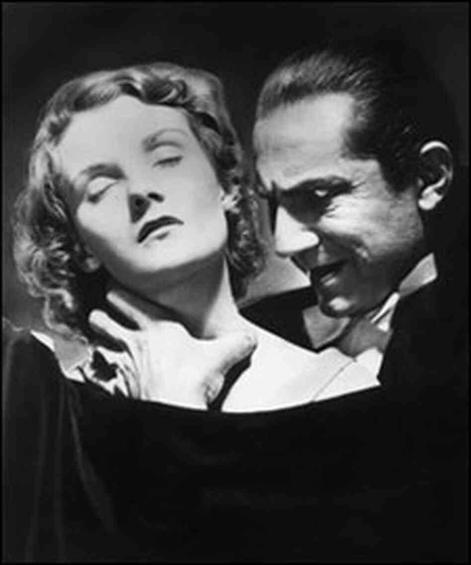 Bela Lugosi prepares to bite the neck of an unconscious woman in a still 'Dracula.' Bela Lugosi prepares to bite the neck of an unconscious woman in a still 'Dracula.'
