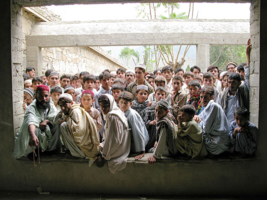 Refugees wait for food in Kunar Province, Afghanistan