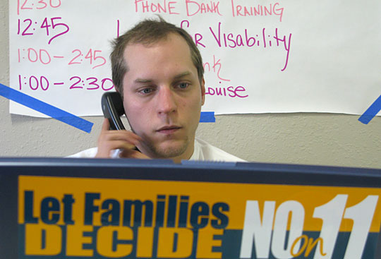 Craig O'Connor, a volunteer for the Campaign for Healthy Families,  contacts prospective voters.