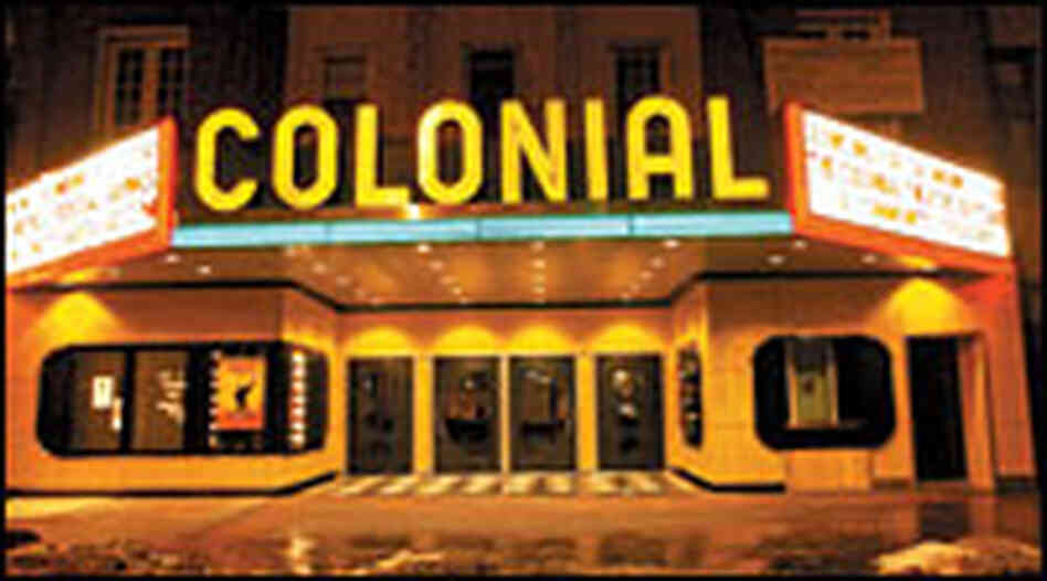 Colonial Theatre marquee at night, neon lit