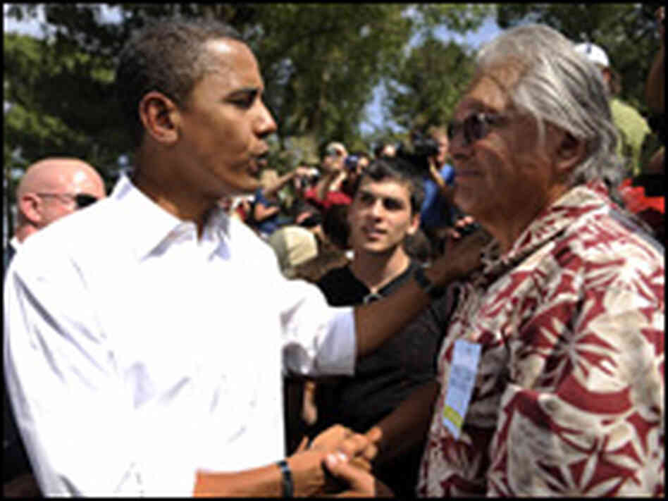 Barack Obama greets a supporter in Elko, Nev.
