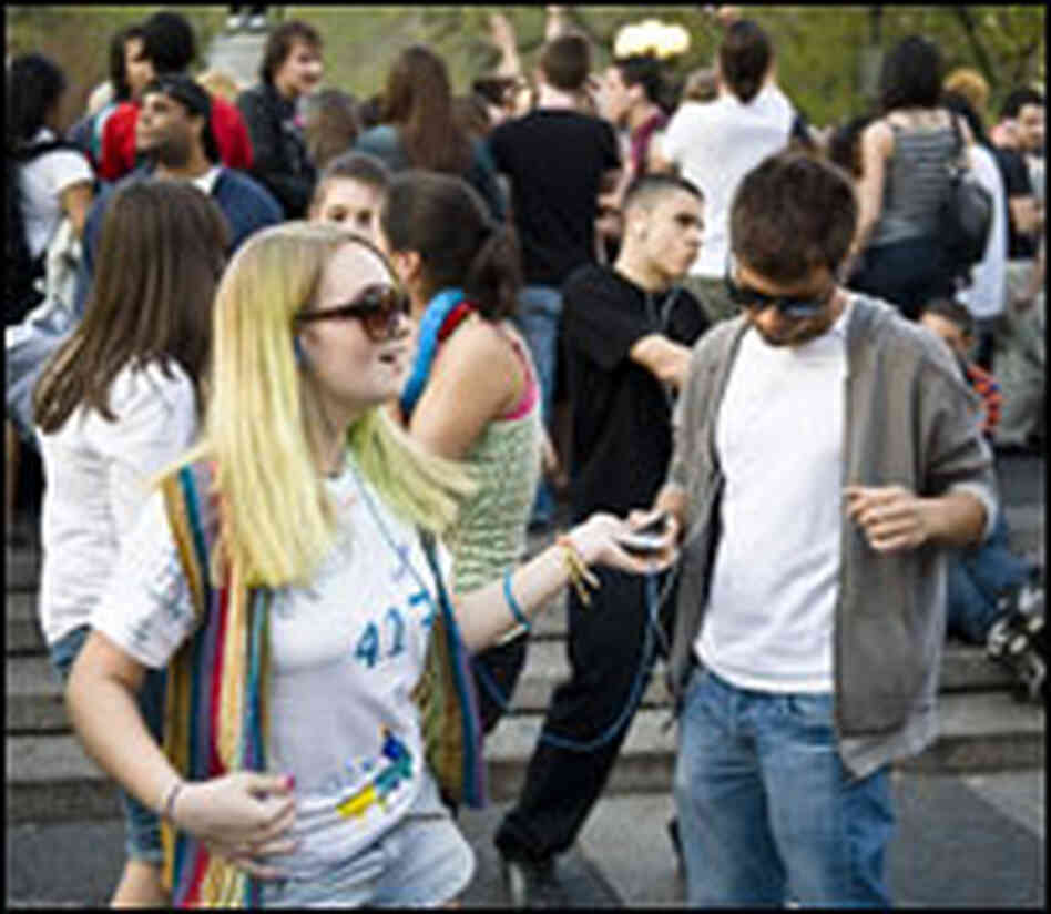 A woman dances at a silent rave in New York's Union Square Park.
