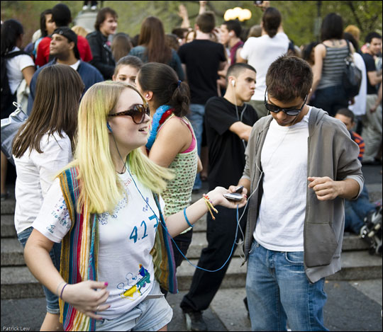 A woman dances at a silent rave in New York's Union Square Park.