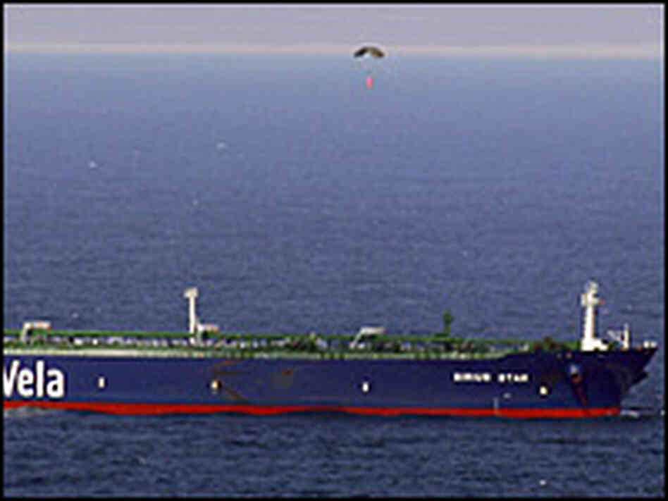 A container is parachuted to a ship being held by Somali pirates, Jan. 9. A container is parachuted to a ship being held by Somali pirates, Jan. 9.