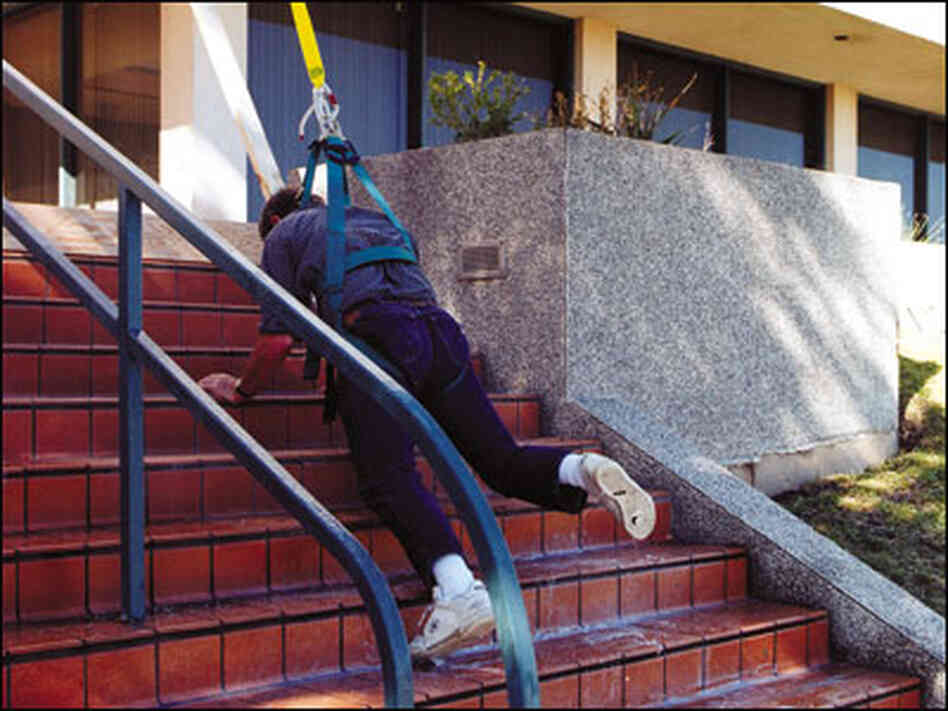A man slips on stairs sprayed with an anti-pirate slick foam A man slips on stairs sprayed with an anti-pirate slick foam