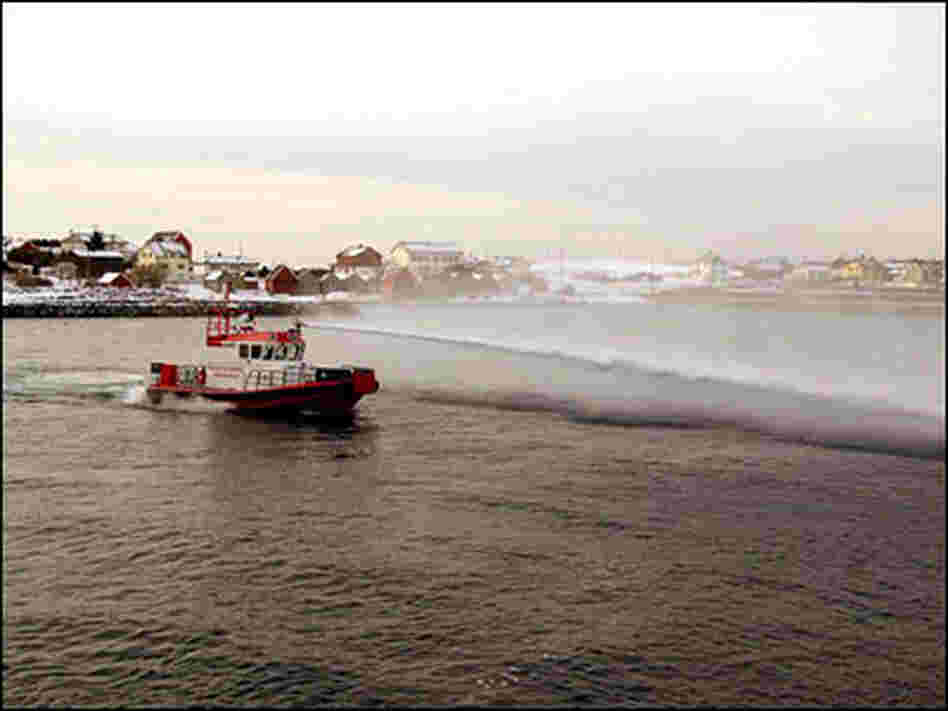 A boat demonstrates the high-power water hose designed to keep pirates at bay. A boat demonstrates the high-power water hose designed to keep pirates at bay.