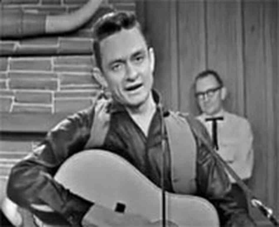 Johnny Cash on the Grand Ole Opry in 1962 Johnny Cash on the Grand Ole Opry in 1962