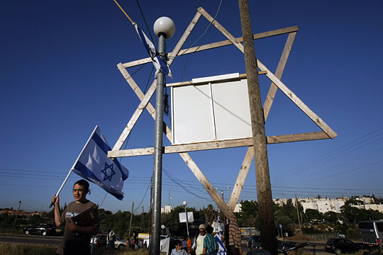 An ultra-Orthodox Jewish boy in a Jewish outpost near Hebron