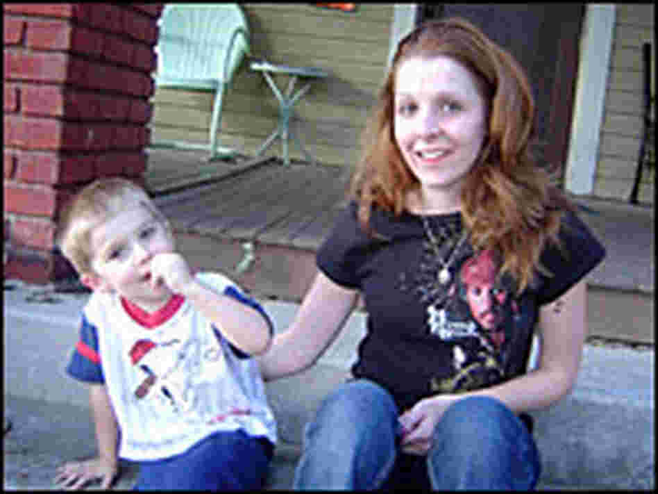The widow of Spc. Timothy Hanley, Markel, and their son, Tim Jr.
