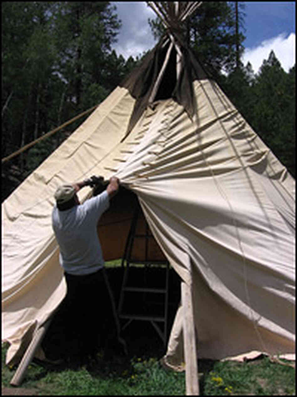 Peyote ceremony organizers set up a teepee