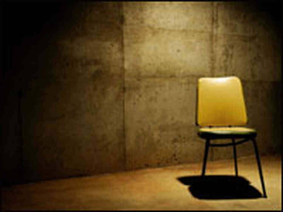 A chair in a room used for torture A chair in a room used for torture