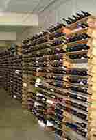 Racks of wine bottles awaiting tasting. Racks of wine bottles awaiting tasting.