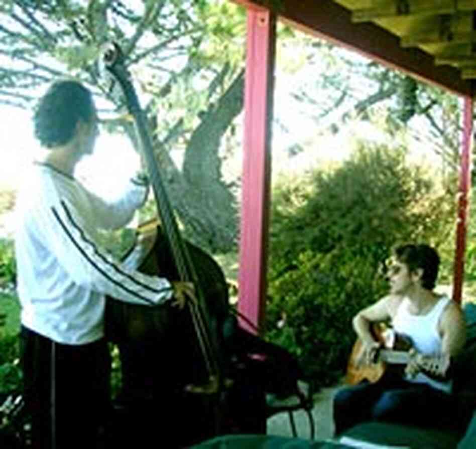 Brazzaville bassist Joe Zimmerman, left, and David Brown jam al fresco. Brazzaville bassist Joe Zimmerman, left, and David Brown jam al fresco.