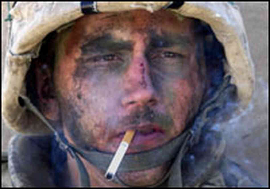 A Marine Smokes a Cigarette A Marine Smokes a Cigarette