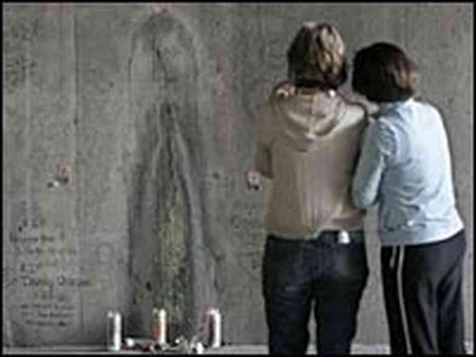 Bette Shober, left, and Joanne Vrablik take a closer look at the stain.