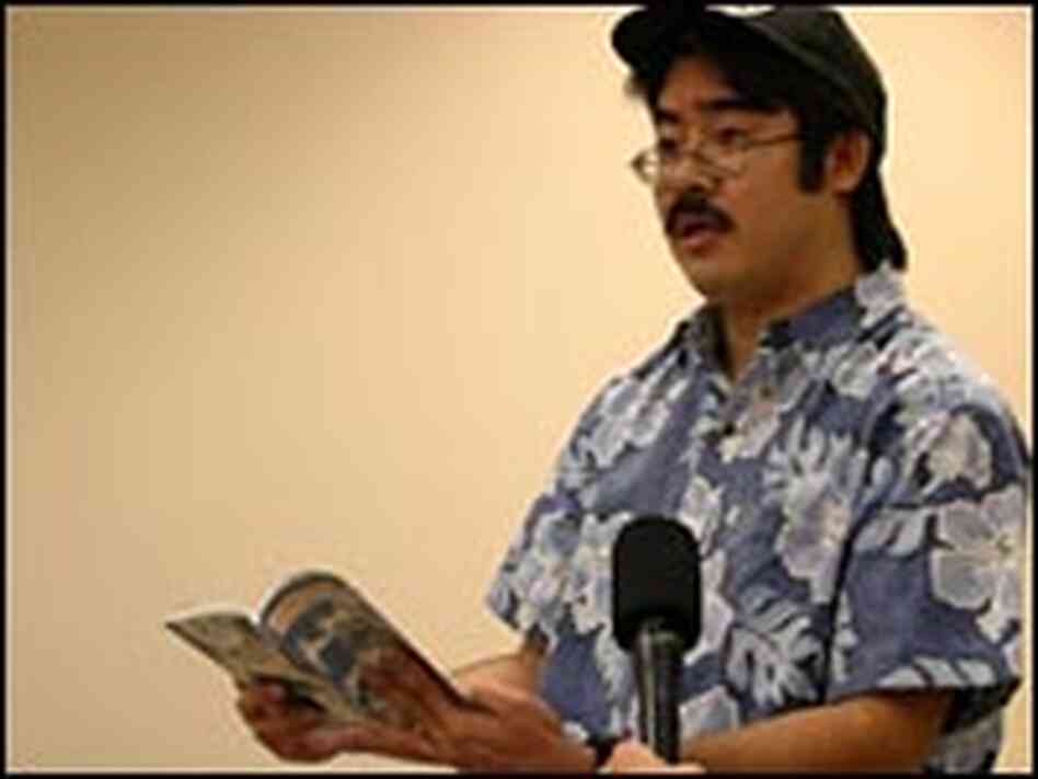 Pidgin scholar Lee Tonouchi reads from one of his books on the subject Pidgin scholar Lee Tonouchi reads from one of his books on the subject