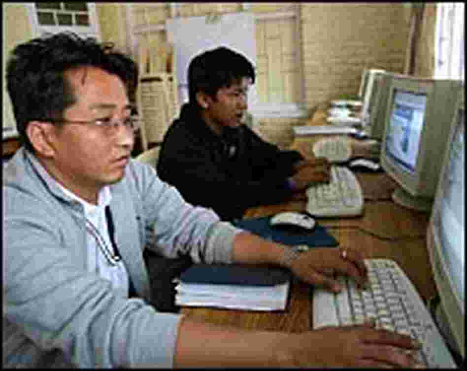 Both adults and children take computer classes at the technology center Both adults and children take computer classes at the technology center