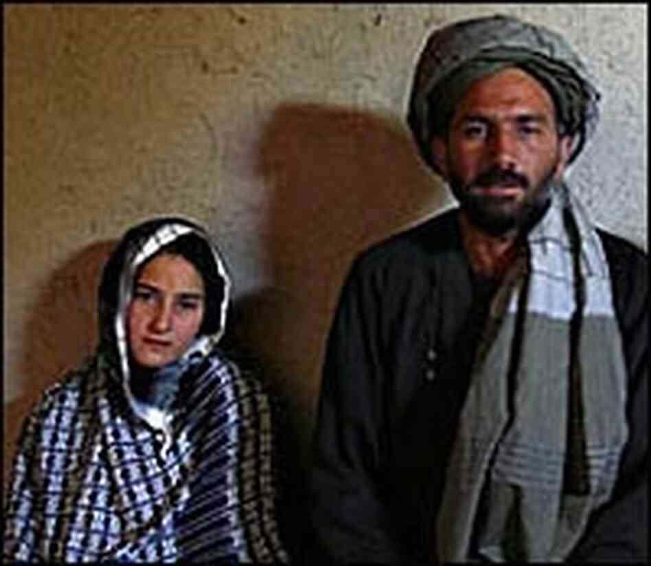 Majabin Mohammed, 13, at left, sits with her husband of six months, Mohammed Fazal, 45.