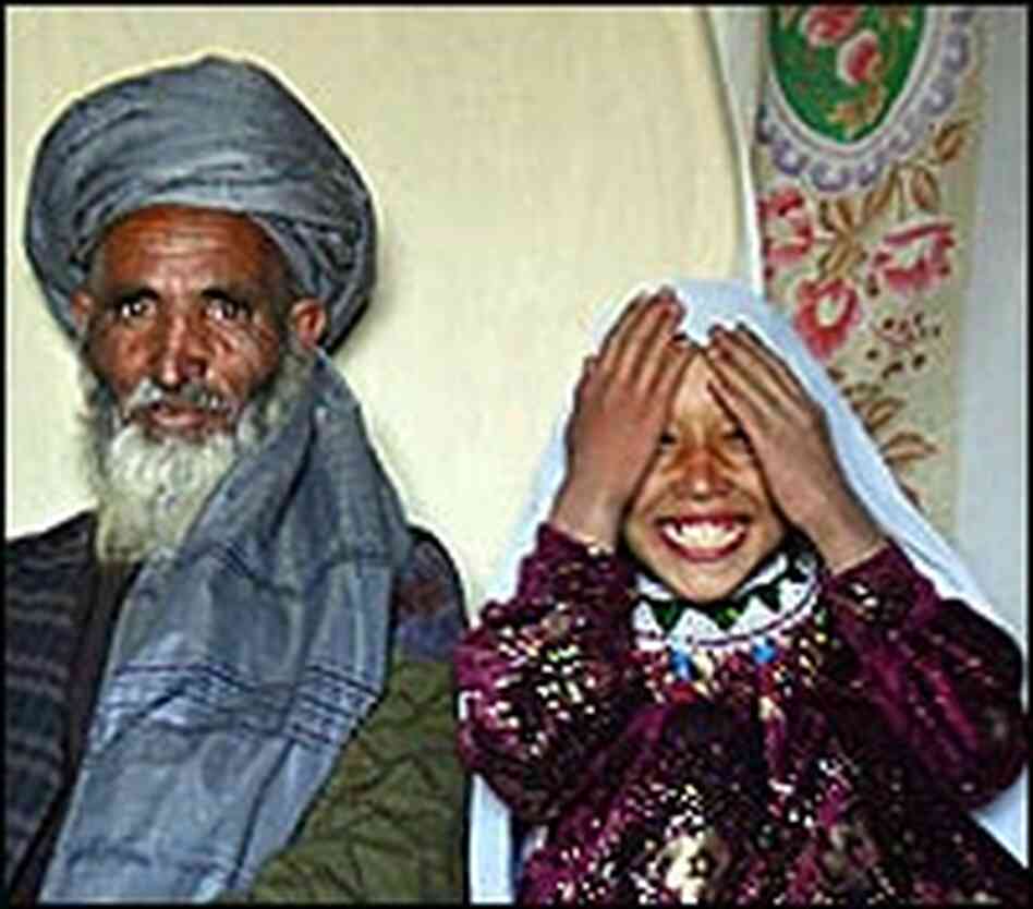 Roshan Qasem, 11, will joing the household of Said Mohammed, 55
