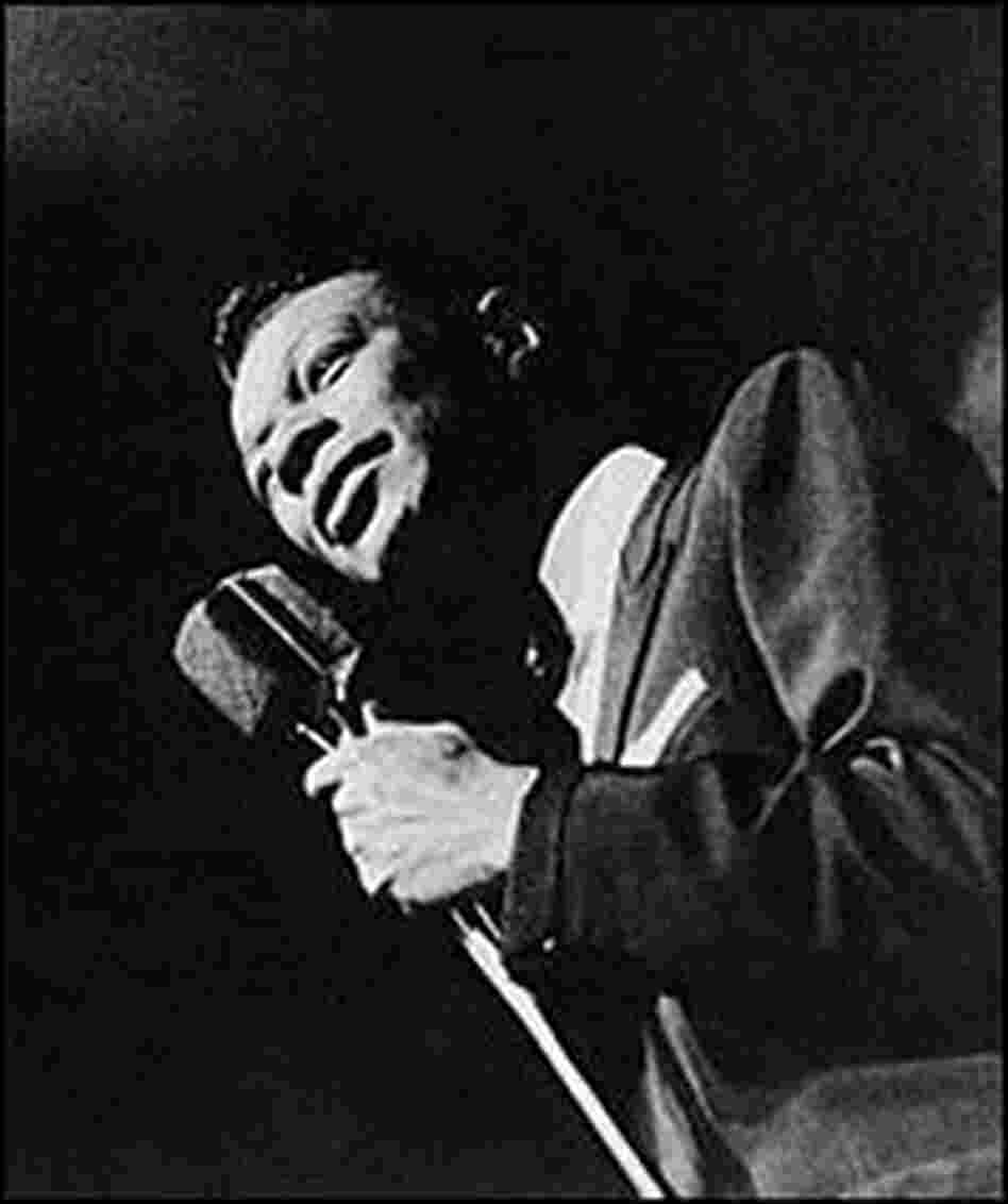 Nat 'King' Cole performs to an audience in the 1950s. Nat 'King' Cole performs to an audience in the 1950s.