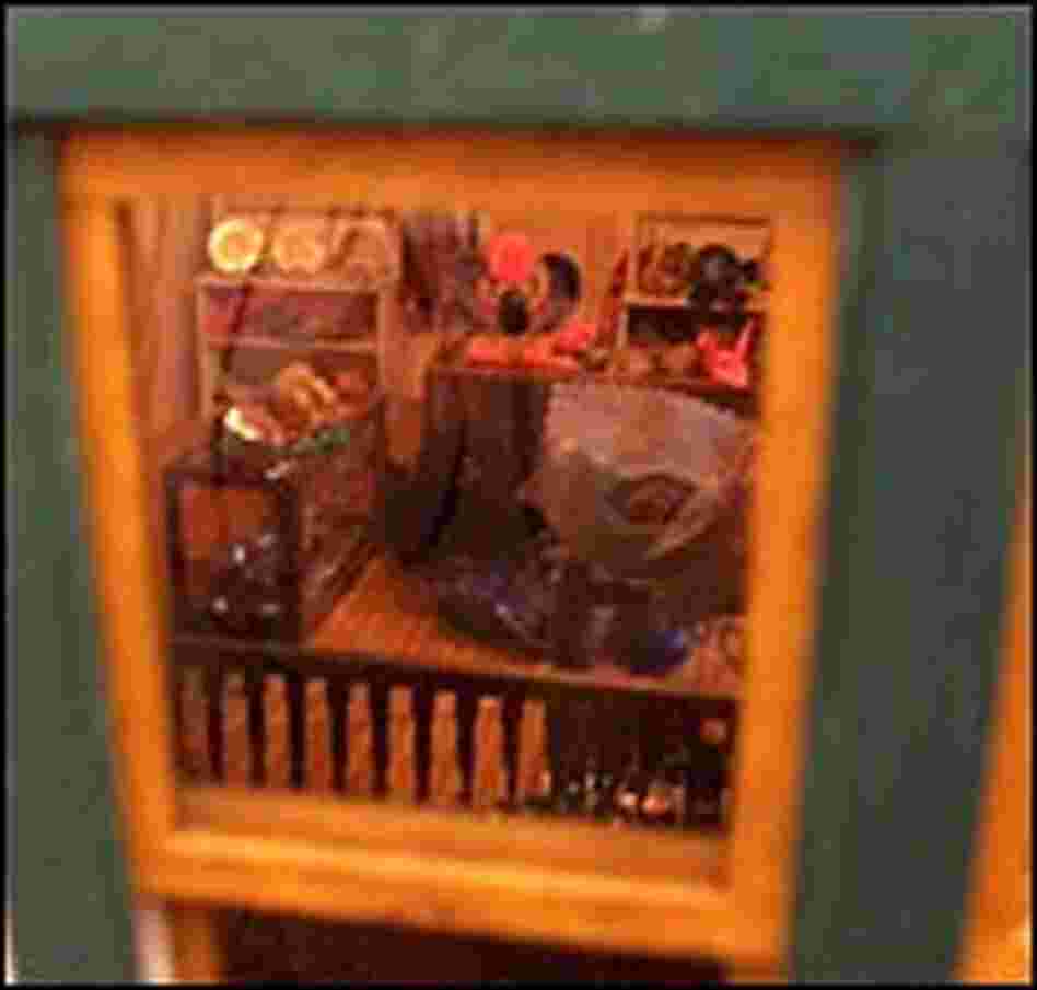 Inside the fairy door at the Peaceable Kingdom toy store is what looks like a tiny general store.